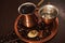 Copper set for making turkish coffee with spices coffee is ready to be served