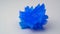 Copper sulphate crystal on white background