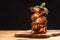 Copy space.Fried chicken wings on a wooden kitchen board on a black background with a copy space