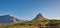 Copy space, landscape view and mountains of Lions Head and Table Mountain in serene, relaxing nature reserve. Blue sky