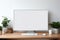 Copy space mockup template computer monitor with a white screen on a wooden table. Cozy minimalistic workplace at home