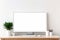 Copy space mockup template computer monitor with a white screen on a wooden table. Cozy minimalistic workplace at home