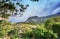 Copy space with scenic landscape of cloudy sky covering the peak of Table Mountain in Cape Town on a misty morning from