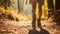 copy space, stockphoto, Close up of female hiker feet walking outdoors in the forest, female legs walking on a forest trail.