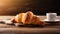 copy space, stockphoto, Croissant on a wooden table. National Croissant Day concept. Taste fresh croissant.