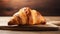 copy space, stockphoto, Croissant on a wooden table. National Croissant Day concept. Taste fresh croissant.
