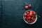 Copy space, Top view. Cherries in bowl on black background