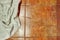 Copy space. Wet creased white towel on ceramic floor in bathroom. Ceramic tile warm colors. For background.