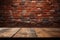 Copy space Wooden table against red brick wall backdrop