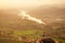 Copy spase lady and boy hugging Hampi ruins hills meeting sunrise sunset