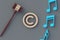 Copyright symbol near judge hammer and notes
