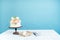 Copyspace mockup working space baker confectioner pastry chef creamy white two-tiered wedding birthday cake with fresh