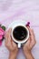 Copyspace picture of hands embracing cup of coffee