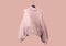 Coral oversize knit sweater on hanger isolated on pink background. Composition of clothes. Banner concept. Trendy clothes collage.