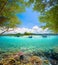 Coral reef in background of tropical desert island