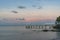 Coral sea Resort jetty, berth in Abel Point Marina at sunset