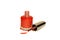 Coral varnish bottle with a brush