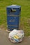 Corby, U.K., June 20, 2019 - plastic bag with trash garbage on street
