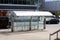 Corby, United Kingdom, August 01, 2021: bus station, town centre, modern glass bus station in street