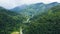 Cordillera on Luzon Island, Philippines, aerial view. High mountains covered by rainforest and river in the gorge.