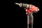 Cordless drill screwdriver isolated on black background