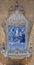 Cordoba - baroque fountain with ceramic image Virgin Mary among the saints on the facade of church of St. Francis and Eulogius.