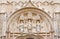 Cordoba - The detail of gothic portal of Royal hospital San Sebastian