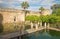 Cordoba - The gardens of Alcazar de los Reyes Cristianos castle in evening