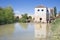 Cordoba - The rest of water mill and Roman bridge with the Torre Calahorra in the background