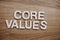 Core Values alphabet letters on wooden background