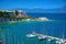 CORFU ISLAND, GREECE, JUN,06, 2013: View on beautiful classic white yachts harbor, Greek sea port, Museum of Asian Art, Faliraki,