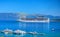 CORFU ISLAND, GREECE, JUN,06, 2014: Giant amazing white touristic passenger liner vip yachts in Ionian Sea. MSC FANTASIA cruise li