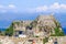 Corfu panorama over the old city. Venetian fortress in background and old clock tower, city symbol.