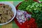 Coriander, lentils, red peppers, shallots, sliced â€‹â€‹vegetables, herbs, top view.