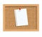 Cork board with pinned paper notepad sheets