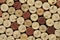 Cork wine bottle tops with numbers of years arranged close to each other. Closeup