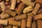 Corks of wine in a large number of straight lines for texture and background decor and menu