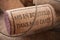 - corks wine on wooden background with french text