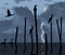 Cormorants gather for the night on pilings in the water as a storm clears and the moon emerges