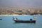 Cormorants perched on an boat in Juan Lopez, Antofagasta, Chile