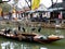 Cormorants on their owner& x27;s boat in Tong Ki water village, Shanghai China.
