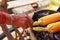 Corn cobs on the grill. Close-up image with corns and hands. Asian, Indian and Chinese street food. Trolley on the beach