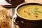 Corn cream soup with bacon chowder on wooden background.