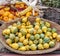 Corn and different varieties of squashes and pumpkins on rustic cork basket. Autumn rustic scene. Selective focus. Closeup