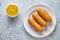 Corn dog American corndog street junk food deep fried hotdog meat sausage snack with mustard