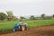 Corn farmers and tractors in Thailand