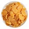 Corn flakes heap in a glass bowl