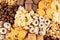 Corn flakes set - rings, balls, stars, pads chocolate, golden as decorative cereals background.