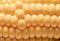 Corn. Food background. Fresh corn cob close up.