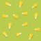 Corn grain. Seamless pattern at green background